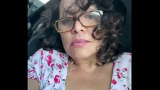 Latina MILF teasing in the car