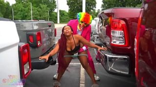 Gibby the clown fucks two ebony sisters in a public parking lot